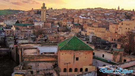 Serene Sunset Over Historic Cityscape wallpaper