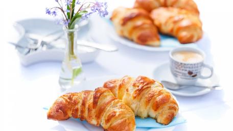Delicious Croissants and Coffee Arrangement wallpaper