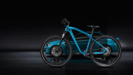 Sleek Blue Bicycle On Display wallpaper