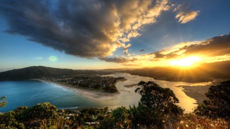 Golden Rays Over Tranquil Bay wallpaper