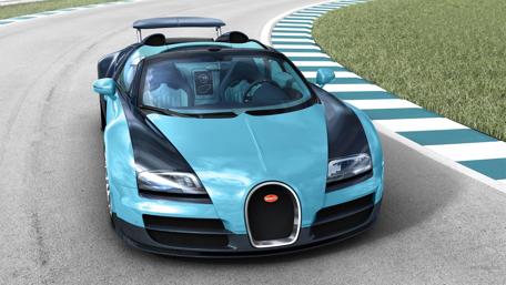 Sleek Blue Supercar on the Track wallpaper