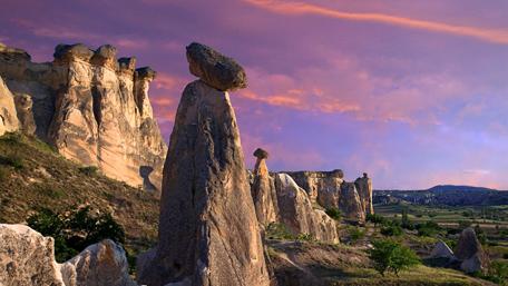 Majestic Rock Formations Under Dramatic Skies wallpaper