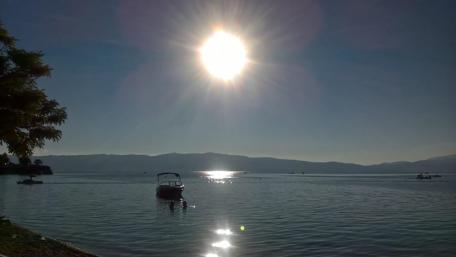 Serene Lake Sunset Over Macedonia's Tranquil Waters wallpaper