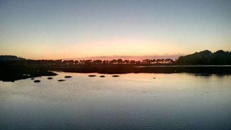 Serene Sunset Over Tranquil Waters wallpaper