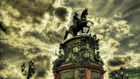 Majestic City Sculpture Against Dramatic Skies wallpaper