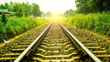 Journey Towards the Horizon Amidst Radiant Sunshine wallpaper