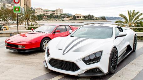 Exquisite Ferrari Duet in Scenic Paradise wallpaper