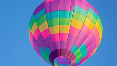 Colorful Hot Air Balloon in Clear Sky wallpaper
