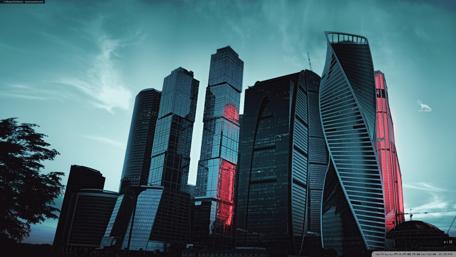 Urban Skyline at Dusk with Dramatic Architecture wallpaper