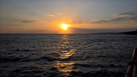 Serene Sunset Over Infinite Waters wallpaper