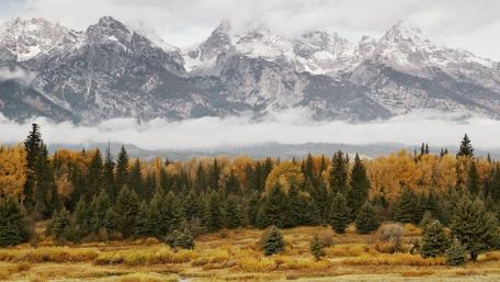 Majestic Mountains Embracing Autumn Beauty wallpaper
