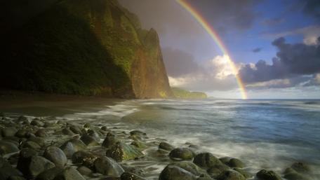 Majestic Rainbow Over Tranquil Shoreline wallpaper