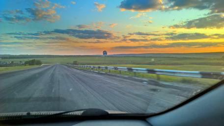 Endless Journey on a Tranquil Roadway wallpaper