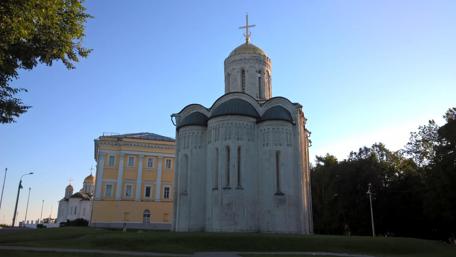 Historic Church amidst Modern Cityscape wallpaper
