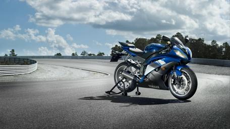Sleek Blue Yamaha Motorbike on a Track wallpaper