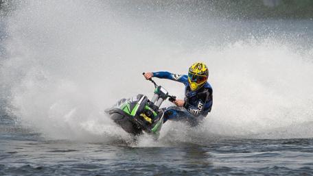 Thrilling Jet Ski Adventure on Water wallpaper