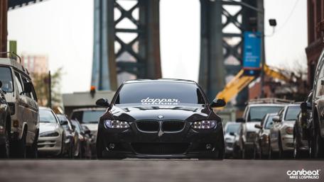 Sleek BMW Stands Out in Urban Setting wallpaper