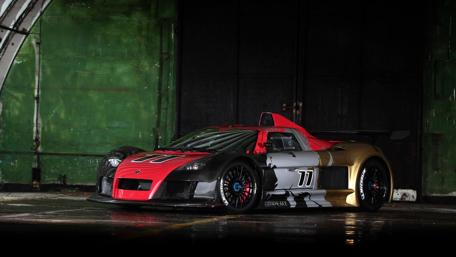Sleek Supercar in an Urban Setting wallpaper