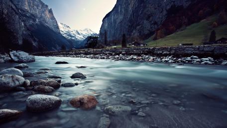 Tranquil Mountain Stream Under Moonlight wallpaper