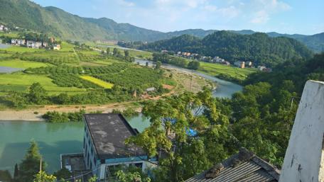 Peaceful River Valley in Lush Greenery wallpaper