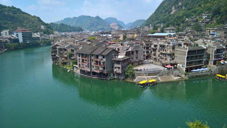 Serene Cityscape Overlooking Tranquil Waters wallpaper