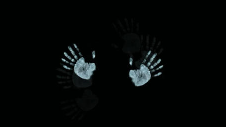Mystical Handprints in Darkness wallpaper