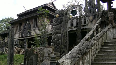 Enchanting Wooden Architecture and Nature's Embrace wallpaper