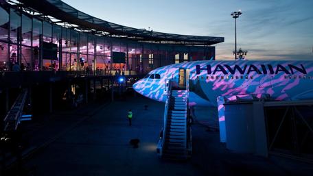 Vibrant City Lights at Airport Evening Scene wallpaper