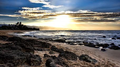 Serene Sunset Over Tranquil Shoreline wallpaper