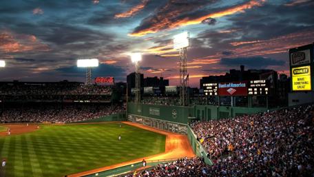 Spectacular Sunset Over a Baseball Stadium wallpaper