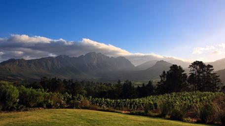 Majestic Mountain View Amidst Lush Greenery wallpaper