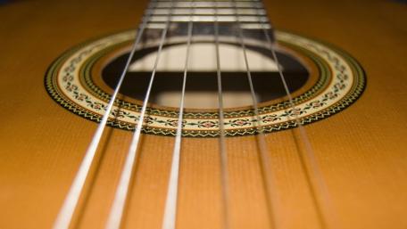 Strings of Serenity: Acoustic Guitar Close-Up wallpaper