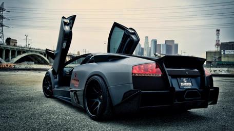 Sleek Matte Supercar with Iconic Doors wallpaper