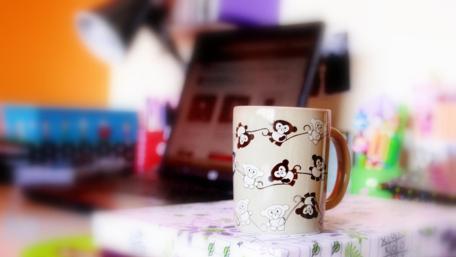 Cozy Workspace Inspiration with a Playful Mug wallpaper