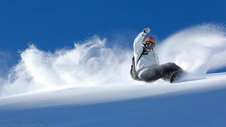 Thrilling Snowboarding in Pristine Powder Fields wallpaper