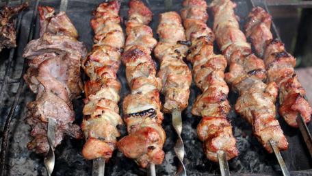 Sizzling Skewers of Delightful Grilled Meat wallpaper