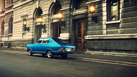 Classic Blue Vintage Car on a Quiet Street wallpaper