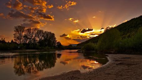 Sunset Over Serene River Landscape wallpaper