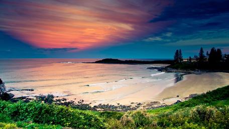 Serene Sunset Over Tranquil Beach Scene wallpaper