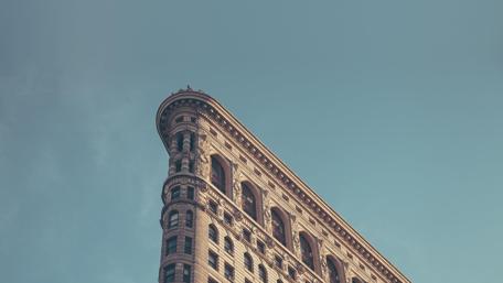 Unique Architectural Marvel Against Clear Sky wallpaper