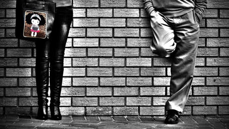 Silent Moments of Love Amidst Brick Walls wallpaper