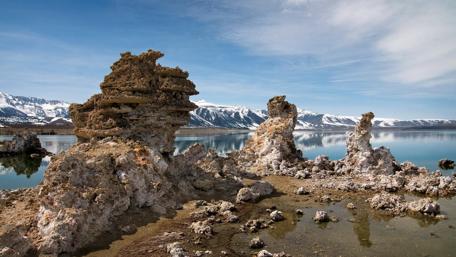 Majestic Rock Formations by the Tranquil Lake wallpaper