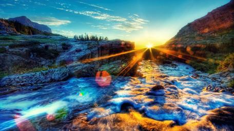 Serene Sunset Over Tranquil Creek Landscape wallpaper