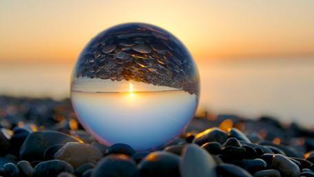 Captivating Sunset Reflected in a Crystal Ball wallpaper
