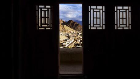 A Glimpse of City Life Through Open Doors wallpaper