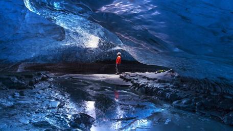 Majestic Ice Cave in Glacial Beauty wallpaper