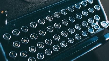 Vintage Typewriter Keys Close-Up Inspiration wallpaper