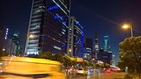 Vibrant City Nights Illuminated by Neon Lights wallpaper