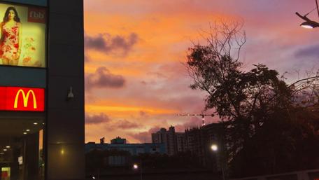 Vibrant Sunset Over Urban Landscape wallpaper