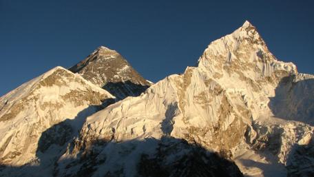 Majestic Himalayan Peaks Under Clear Skies wallpaper